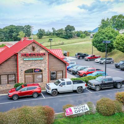 Exterior, view of the restaurant and parking lot.