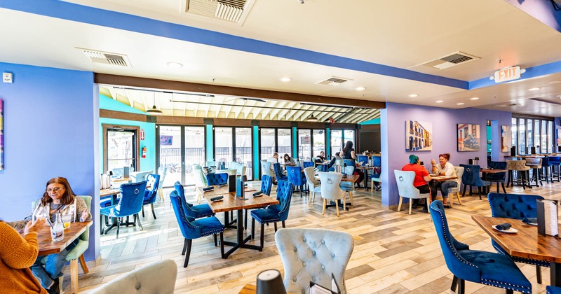 Interior, dining area, tables ready for guests