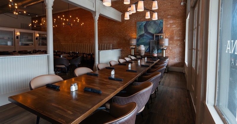Dining area with a vast table ready for guests