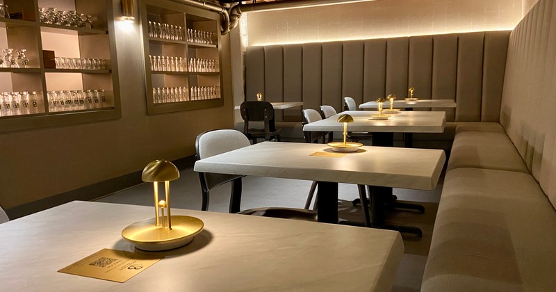 Decorated lounge area with seating and coffee tables