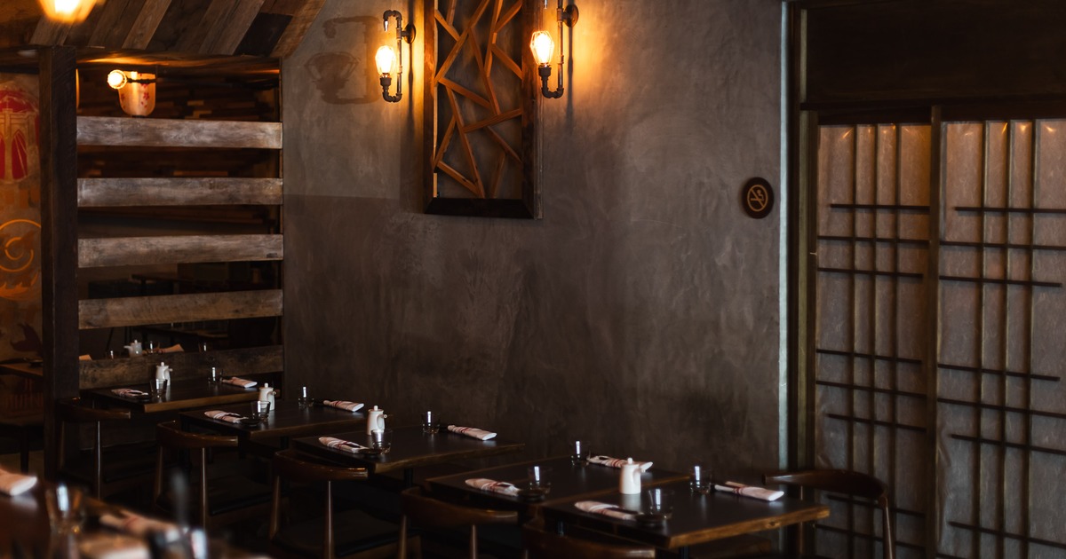 Small dining tables set for guests