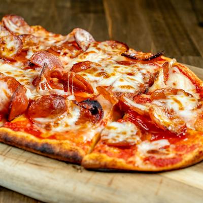 Grilled Flat Bread with Pepperoni and Hot Honey, close-up.