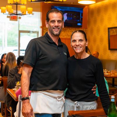 Staff in a cozy restaurant.