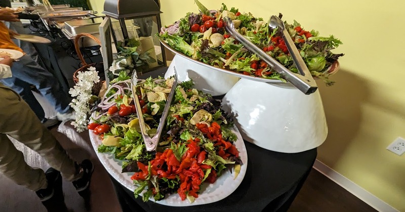 Catering trays with salad served at an event