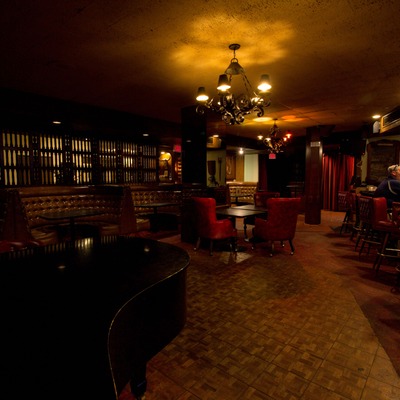 Interior, lounging area, grand piano.