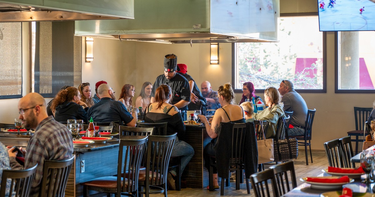 Dinrer area, wide view, guests, chef