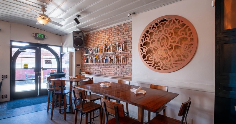 Interior seating area, tall tables and bar stools