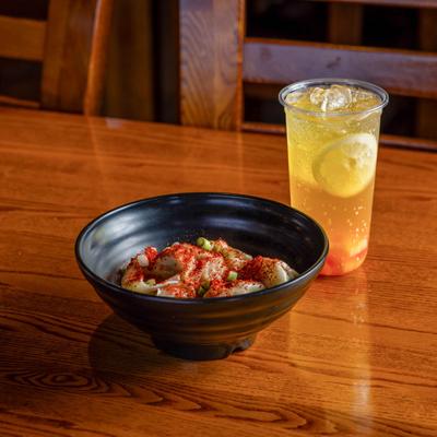 Mala wontons with a drink.