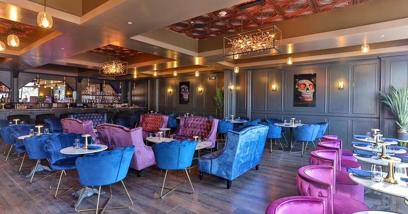 Interior, sofas, tables and chairs, art on the wall