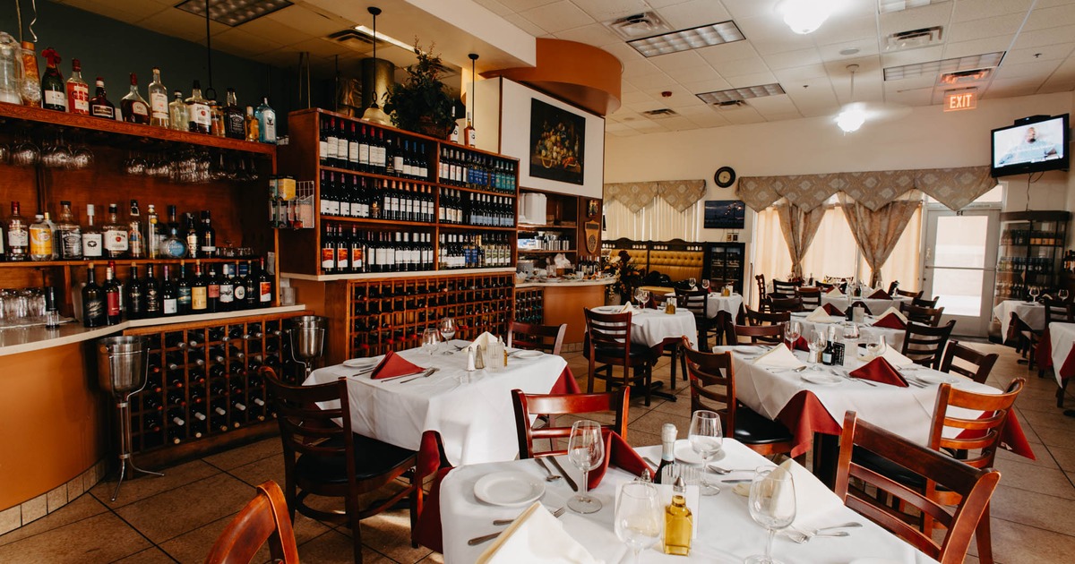 Interior, dining area, tables and chairs ready for guests