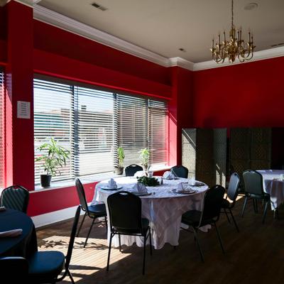 Interior with tables with a window view.