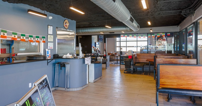 Interior, front counter, seating and a dining area