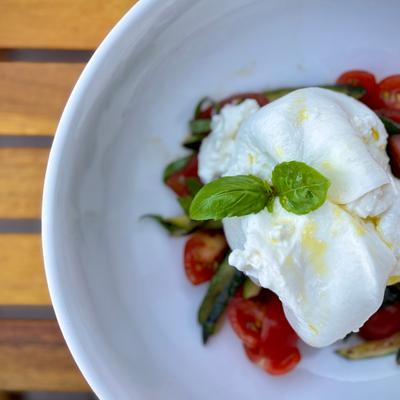Burrata with tomatoes and basil.