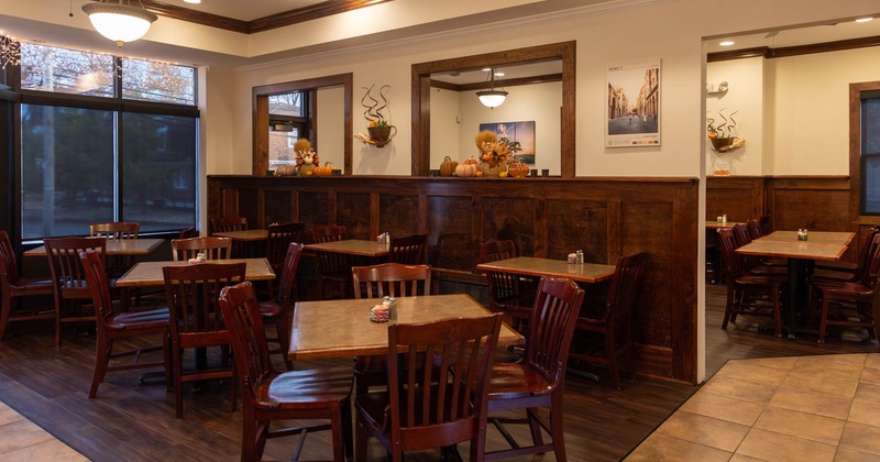 Dining area, tables and chairs ready for guests