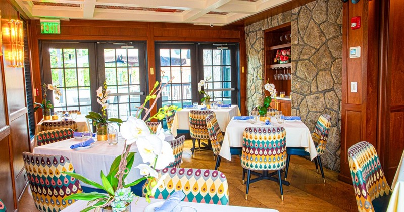 Interior, dining tables ready for guests