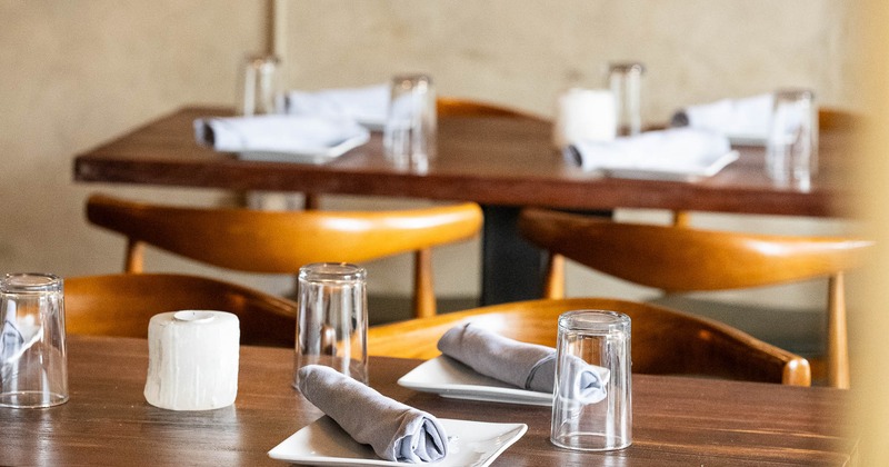 Interior, tables set for guests