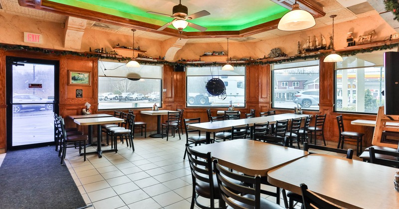 Inside, seating area with tables and chairs