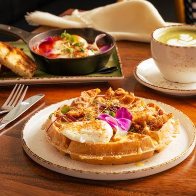 Nutella Love waffle, shakshuka and a cup of latte.