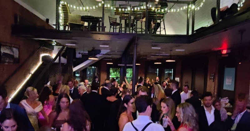 Private parties room, guests chatting and enjoying their drinks