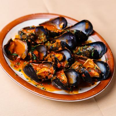 Mussels in marinara sauce.