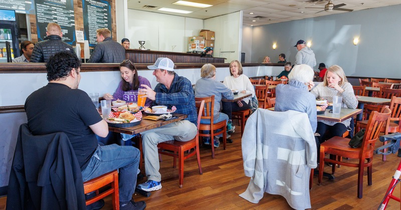 Interior, diner area, tables and chairs, guests
