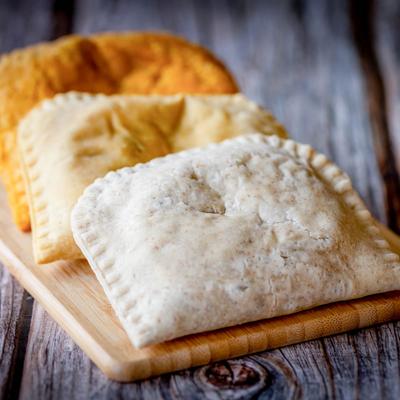 Three patties, beef, curry chicken, and vegetable.