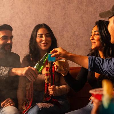 Guests toasting with drinks