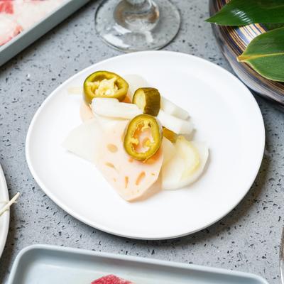 Plate of various pickled vegetables.