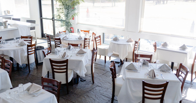 Dining area, tables set and ready for guests