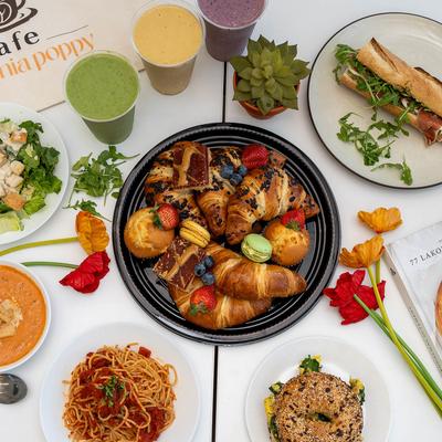 Assorted food plates and smoothies.