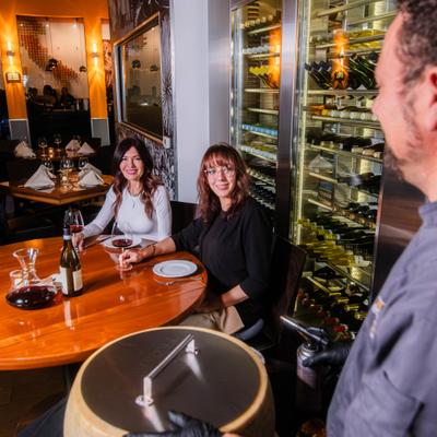 Employee tending to customers.