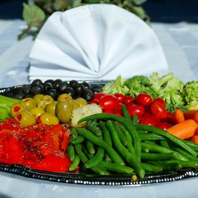 Fresh vegetables served on a tray.