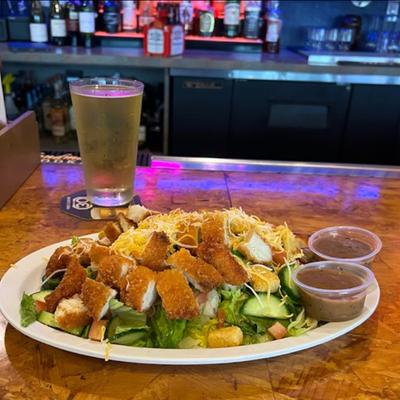 crispy chicken salad with pint of beer