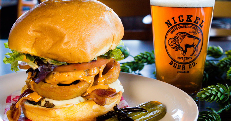 Double burger, glass of beer on the side