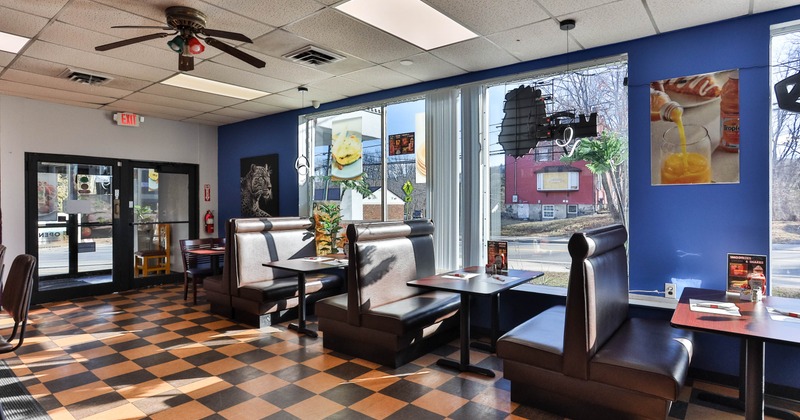 Interior dining area with double booths and tables