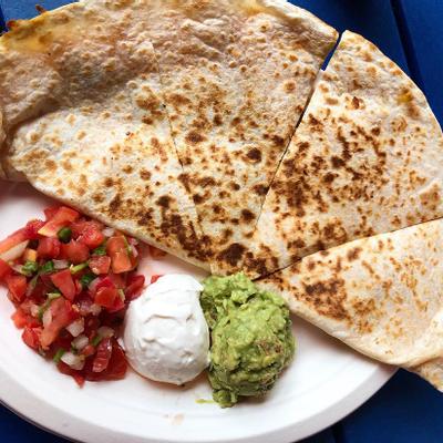 Tortillas served with guacamole, salsa and sour cream