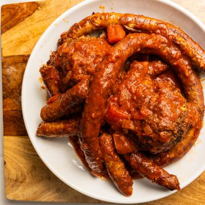 Nanna's Pasta Bowl with meatballs and sausages in tomato sauce.