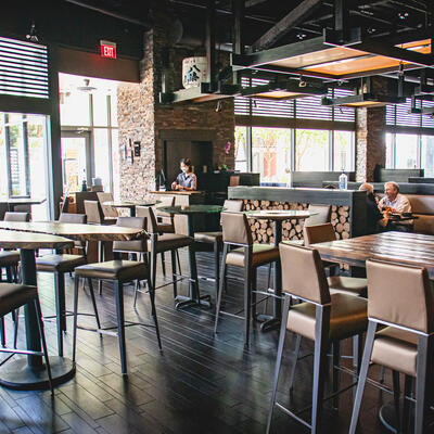 Restaurant interior, high chairs and tables