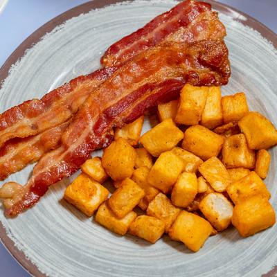 bacon and home fries, served