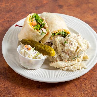 Grilled Chicken Wrap, served with pasta salad.