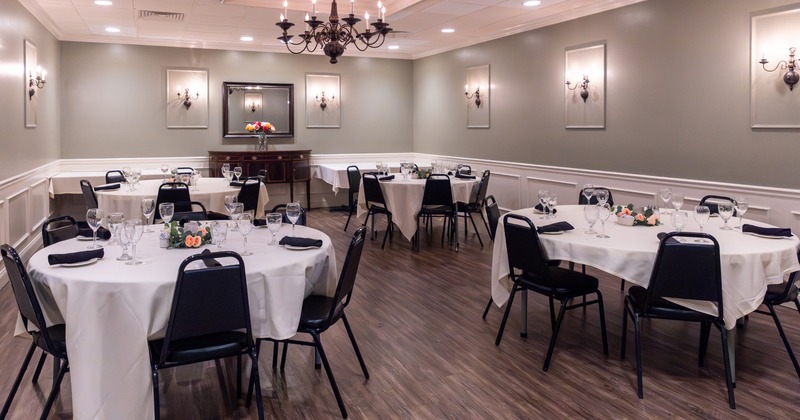 Private dining room with elegant set tables perfect for any occasion