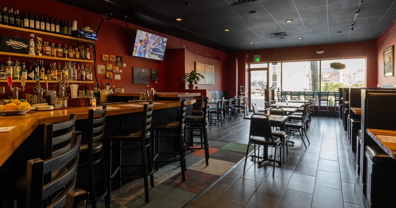 Interior, bar on the left side and seating on the right side