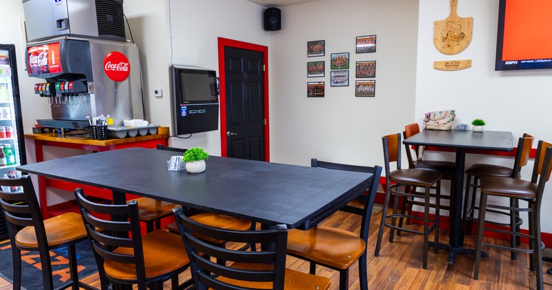 Diner area, table, stools, drink beverage mashine