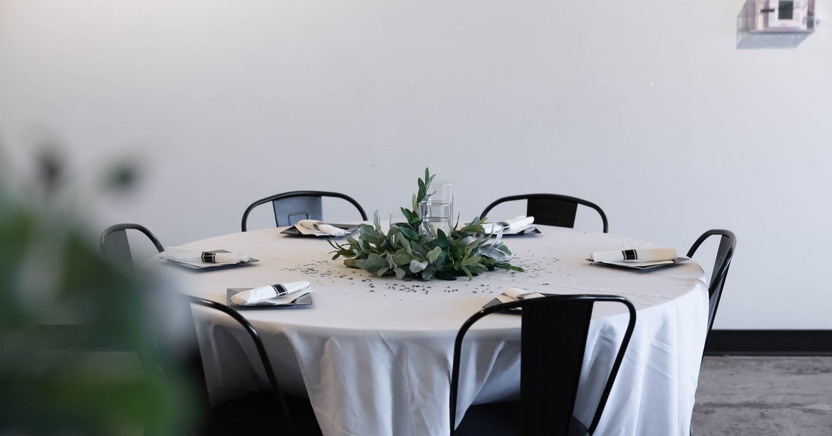 Interior, round table set for guests