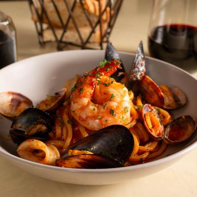 Seafood  tonarelli spaghetti in tomato sauce.