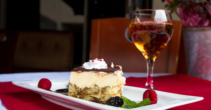 tiramisu and glass of wine