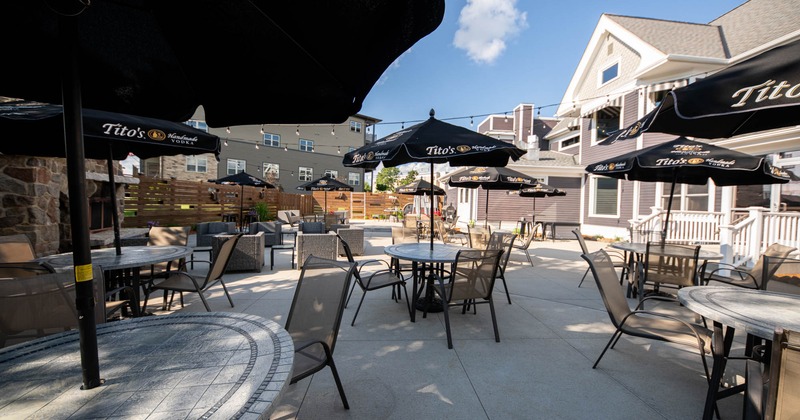 Exterior, patio, tables with parasols, chairs