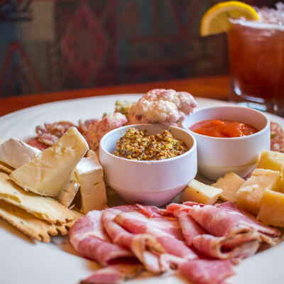 Sampler platter with dips, deli meats and cheese