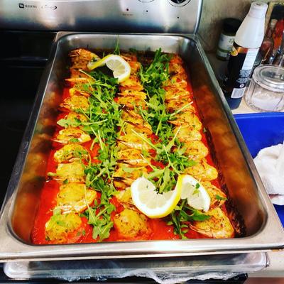 Prepared food in a large serving pan.