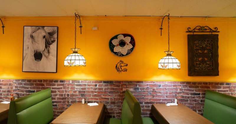 Interior dining area with double booths and tables